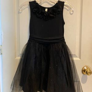 Girls black dress with glitter overlay